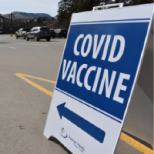 COVID vaccine sign