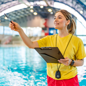 Female lifeguard at an indoor pool