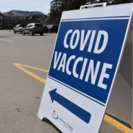 COVID vaccine sign