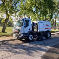 Vacuum street sweeper