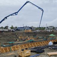 truck pouring concrete at ALC site