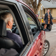 car yielding to pedestrian