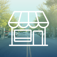Image of downtown Vernon street with blue overlay and storefront graphic